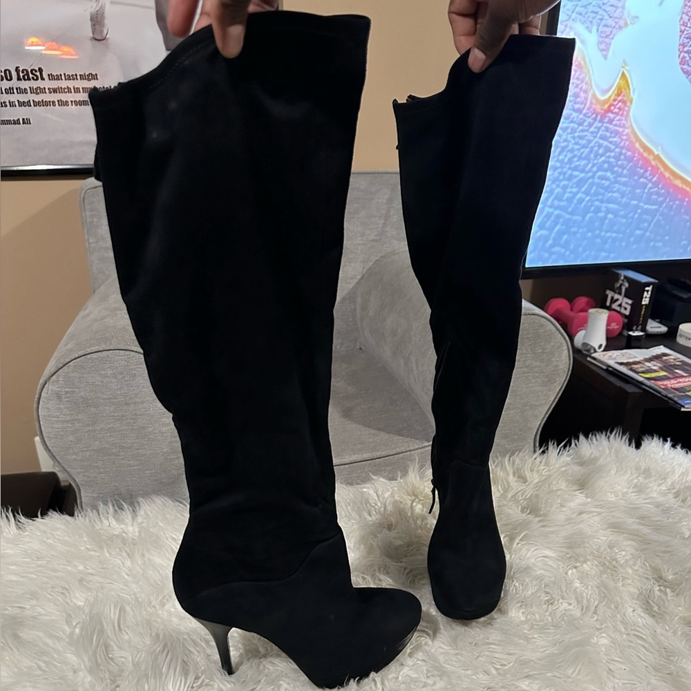 Black over the knee suede boot..